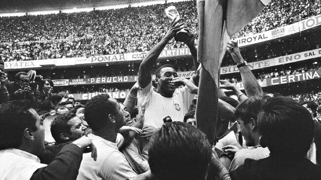 Pelé with the World Cup trophy 